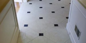Christianson Lee Studios painted faux inlaid marble Foyer floor with keystones