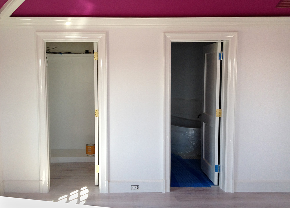 Custom designed magenta ikat stencil on Bedroom walls - Before view