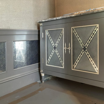 Verre églomisé Powder Room vanity and dado