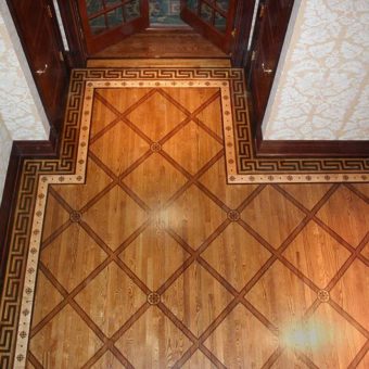 painted floor faux inlaid mahogany checkerboard greek key foyer entry 1